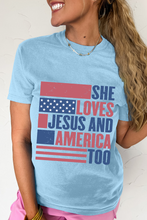 Load image into Gallery viewer, Light Blue SHE LOVES JESUS AND AMERICA TOO Flag Graphic T Shirt
