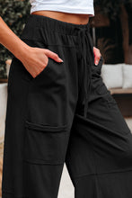 Load image into Gallery viewer, Black Mineral Wash Exposed Seam Drawstring Elastic Waistband Wide Leg Cargo Pants
